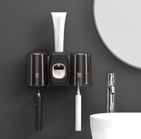 Creative automatic toothpaste squeezer and toothbrush holder set