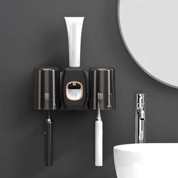 Creative automatic toothpaste squeezer and toothbrush holder set