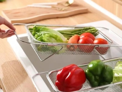 Stainless steel expandable over the sink colander