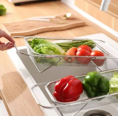 Stainless steel expandable over the sink colander