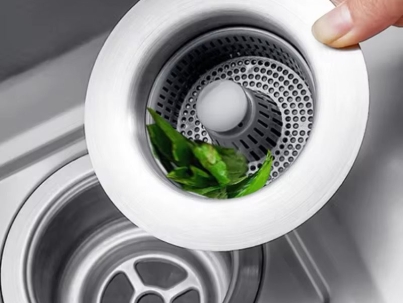 Stainless steel kitchen sink strainer with pop-up drain